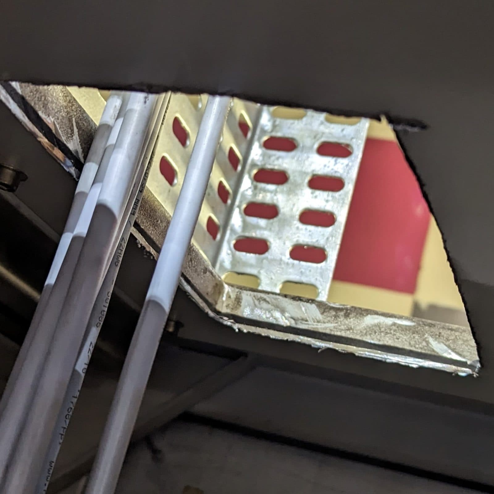 Electrical cabinet with hole in it